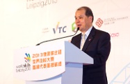 The Secretary for Labour and Welfare, Mr Matthew Cheung Kin-chung, speaks at the Flag Presentation Ceremony for the Hong Kong Delegation. Mr Cheung says the biannual "WorldSkills Competition" provides a platform for the young participants to exchange experience which in turn can help raise the professional standards of various trades.