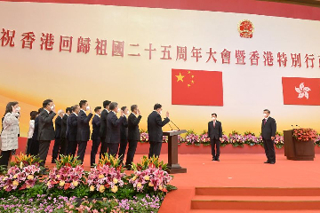 President Xi Jinping (first right) swears in Principal Officials of the sixth-term Hong Kong Special Administrative Region Government at the Inaugural Ceremony of the Sixth-term Government of the Hong Kong Special Administrative Region at the Hong Kong Convention and Exhibition Centre this morning (July 1). Looking on is the Chief Executive, Mr John Lee (second right).