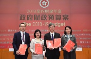 The Secretary for Labour and Welfare, Dr Law Chi-kwong (second right), held a press conference to elaborate on labour and welfare initiatives in the 2018-19 Budget. The Permanent Secretary for Labour and Welfare, Ms Chang King-yiu (second left); the Director of Social Welfare, Ms Carol Yip (first right); and the Commissioner for Labour, Mr Carlson Chan (first left) also attended.