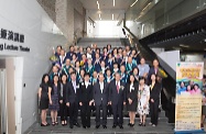 Mr Cheung (front row, fifth right) and other officiating guests are pictured with the elder graduates to share their joy of graduation.