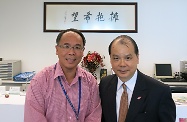 Mr Cheung (right) is pictured with Dr Paul Yip.
