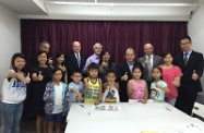 Mr Cheung (back row, fourth right) with staff and service users of the centre.