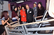 The Secretary for Labour and Welfare, Mr Matthew Cheung Kin-chung, today attended the opening ceremony of Po Leung Kuk Wan Chai Home for the Elderly cum Day Care Centre for the Elderly. Picture shows a staff member briefing Mr Cheung (third right); the Chairman of Po Leung Kuk, Dr Eleanor Kwok (fourth right) and other guests on the home's facilities.