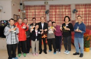 The Secretary for Labour and Welfare, Mr Matthew Cheung Kin-chung, visited the Hang Ngai Workshop cum Hostel operated by the Tung Wah Group of Hospitals today (February 5). Photo shows Mr Cheung (fifth right) with a group of service users.