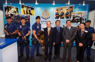 Mr Cheung (fourth left), Mr So (fourth right) and Professor Cheung (third right) are pictured at a booth hosted by the Hong Kong Police Force.