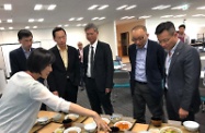 The Secretary for Labour and Welfare, Dr Law Chi-kwong, today (August 5) visited Future Care Lab in Japan in his visit to Tokyo, Japan. Photo shows (from left) the Chief Executive of the Hong Kong Council of Social Service (HKCSS), Mr Chua Hoi-wai; the Chairperson of the HKCSS, Mr Bernard Chan; Dr Law; the Assistant Director of Social Welfare (Elderly), Mr Tan Tick-yee; and the Executive Director, Charities and Community of the Hong Kong Jockey Club, Mr Cheung Leong, being introduced to tailor-made food products for the elderly.