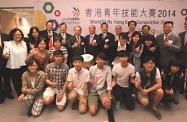 Mr Cheung (sixth left, back row) is pictured with Mr Herman Hui (seventh left, back row), Dr Clement Chen (eighth left, back row), Mr Lee Shing-see (fifth left, back row), the Executive Director of Vocational Training Council, Mrs Carrie Yau (second left, back row) and other participating guests and contestants.