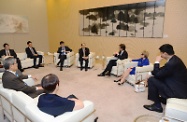 The Acting Chief Secretary for Administration, Mr Matthew Cheung Kin-chung (fourth right), today (June 6) exchanges views with a delegation led by the Chairman of Special Olympics International, Dr Timothy Shriver (third right).