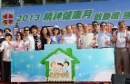 The Secretary for Labour and Welfare, Mr Matthew Cheung Kin-chung officiated at the launching of Mental Health Month 2013 and the annual Mental Health Walk at Victoria Park in Causeway Bay to commence a five-month programme of public education activities. Picture shows Mr Cheung (fourth right, front row) kicks off Mental Health Month 2013 with the Chairman of the Rehabilitation Advisory Committee, Mr Herman Hui (third right, front row); the Chairman of the Organising Committee of Mental Health Month, Dr Fung Cheung-tim (second right, front row); the Deputy Secretary for Labour and Welfare (Welfare), Ms Doris Cheung (fifth left, front row); as well as the Mental Health Ambassadors, Dr Peter Cheung (third left, front row) and Ms Eugina Lau (fourth left, front row).
