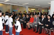 The Secretary for Labour and Welfare, Mr Matthew Cheung Kin-chung (second right), joins the visiting Queen of Belgium, Her Majesty Queen Mathilde (fourth right), to visit Benji's Centre. Photo shows them watching a singing performance by children undergoing speech therapy in the centre. First and fifth right are the founders of Benji's Centre, Mrs Viola Wong and Mr Raymond Wong. Other guests joining today's visit are the Deputy Prime Minister and Minister of Foreign Affairs, Foreign Trade and European Affairs of Belgium, Mr Didier Reynders (third right); the Consul General of Belgium to Hong Kong, Mr Evert Maréchal (sixth right); and the Deputy Secretary for Labour and Welfare, Ms Doris Cheung (seventh right).