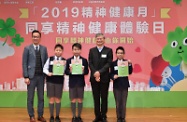 The Secretary for Labour and Welfare, Dr Law Chi-kwong, today (December 7) attended "Enjoy Mental Wellness" ceremony of 2019 Mental Health Month. Photo shows Dr Law (second right) with winners of a message-writing contest on sharing by ex-mentally ill persons under an annual territory-wide mental health promotion programme.