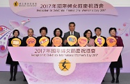 The Chief Executive, Mr C Y Leung, officiated at a reception organised by the Women's Commission to celebrate International Women's Day 2017 at Central Government Offices in Tamar. Photo shows (from left) the Permanent Secretary for Labour and Welfare, Miss Annie Tam; the Chief Secretary for Administration, Mr Matthew Cheung Kin-chung; Deputy Director of the Liaison Office of the Central People's Government in the Hong Kong Special Administrative Region (HKSAR) Ms Yin Xiaojing; the wife of the Chief Executive, Mrs Regina Leung; Mr Leung; the Acting Commissioner of the Ministry of Foreign Affairs of the People's Republic of China in the HKSAR, Madame Tong Xiaoling; the Secretary for Labour and Welfare, Mr Stephen Sui; and the Chairperson of the Women's Commission, Mrs Stella Lau, officiating at the lighting ceremony.