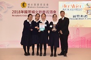 Secretary for Labour and Welfare, Dr Law Chi-kwong, presents prizes to winners of the "Her Voice" Video Competition co-organised by the Labour and Welfare Bureau and the Women's Commission (WoC) to promote the Convention on the Elimination of All Forms of Discrimination against Women of the United Nations among secondary school students before the WoC's reception to celebrate International Women's Day 2018.