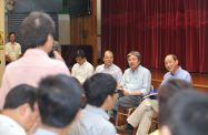 The Financial Secretary, Mr John C Tsang (second right), and the Secretary for Labour and Welfare, Mr Matthew Cheung Kin-chung (third right) visit Tai Po District to listen to people's views and aspirations at the Tai Po Old Market Public School.