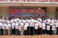 The Secretary for Labour and Welfare, Mr Stephen Sui (seventh left), visited elderly households and families in need in Wong Tai Sin District under the "Celebrations for All" project. Picture shows Mr Sui in a group photo with other team members before the visits.