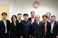 Mr Cheung (fourth right) is pictured with Mr Gu Chaoxi (fourth left) and the delegation of the Ministry of Civil Affairs.