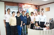 Mr Cheung (second right) and  Mr Fisher (first right) pictured with officers from Labour and Welfare Bureau (first and second from left) and senior staff of Oxfam Hong Kong.