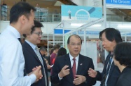 The Secretary for Labour and Welfare, Mr Matthew Cheung Kin-chung, visited the Job Fair for Middle-aged and Elderly Employment organised for the first time by the Labour Department this afternoon. Photo shows Mr Cheung (centre) being briefed on the job fair by the Deputy Commissioner for Labour (Labour Administration), Mr Byron Ng (second right); the Assistant Commissioner for Labour (Employment Services), Mr Charles Hui (second left); and subject officers.