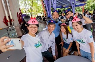 The Secretary for Labour and Welfare, Dr Law Chi-kwong, attended the launch ceremony of "Disney Friends for Change Youth Grant" jointly organised by the Hong Kong Disneyland Resort (HKDL) and the Hong Kong Federation of Youth Groups at HKDL and celebrated HKDL's 12th anniversary. Picture shows Dr Law (front row, second left) taking a selfie with the Managing Director of HKDL, Mr Samuel Lau (back row, second right), and youth volunteers.
