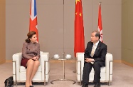 The Secretary for Labour and Welfare, Mr Matthew Cheung Kin-chung (right), meets the British Consul General to Hong Kong and Macao, Ms Caroline Wilson, at Central Government Offices, Tamar to announce the establishment of the Working Holiday Scheme between Hong Kong and the United Kingdom.