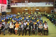 Mr Cheung (centre) is pictured with other officiating guests, mentors and youth participants.