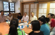 The Secretary for Labour and Welfare, Mr Matthew Cheung Kin-chung (back row, fourth left), visited the Society for Community Organization (SoCO) New World Community Centre in Sham Shui Po. Accompanied by the Director of SoCO, Mr Ho Hei-wah (back row, fifth left), Mr Cheung chatted with service users and volunteers of the Centre to understand the support services much needed by grass-roots families in West Kowloon.