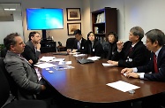 The Secretary for Labour and Welfare, Dr Law Chi-kwong, commenced his visit programme in New York with his delegation. Photo shows Dr Law (second right) meeting with the Executive Director of the Mayor's Office for Economic Opportunity of New York City, Mr Matthew Klein (first left), to exchange views on policies to alleviate poverty.