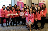 The Secretary for Labour and Welfare, Dr Law Chi-kwong, commenced his visit programme in New York with his delegation and met with the delegation of the Hong Kong Federation of Women (HKFW) attending the 62nd session of the United Nations Commission on the Status of Women. Photo shows Dr Law (front row, fourth left) and the Vice-Chairperson of the HKFW, Dr Maggie Koong (front row, fifth left), with delegates and secondary school students in the delegation supporting the "HeForShe" gender equality programme of UN Women.