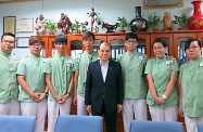 Mr Cheung (fourth right) in a group photo with trainees of the Pilot Project on Multi-skills Workers Training at the Hiu Kwong (To Kwa Wan) Nursing Centre.