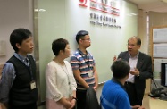 The Secretary for Labour and Welfare, Mr Matthew Cheung Kin-chung, visited Central and Western/Islands Social Security Field Unit and Tung Chung Social Security Field Unit of the Social Welfare Department this afternoon. Photo shows Mr Cheung (first right) talking to frontline staff of Tung Chung Social Security Field Unit to learn more about their daily work and the latest Comprehensive Social Security Assistance caseload and trend.