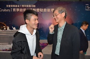 The Child Development Fund (CDF) 10th Anniversary Signature Programme "Dream Cruises" Set Sail Ceremony was held in Kai Tak Cruise Terminal. Photo shows the Secretary for Labour and Welfare, Dr Law Chi-kwong (right), chatting with a CDF participant, Mr Tsang King-lun.