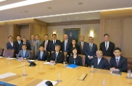 The Secretary for Labour and Welfare, Dr Law Chi-kwong, paid a courtesy visit to the Employers' Federation of Hong Kong (EFHK). Picture shows Dr Law Chi-kwong (front row, third left); Permanent Secretary for Labour and Welfare, Ms Chang King-yiu (front row, fourth left) and the Commissioner for Labour, Mr Carlson Chan (back row, sixth left) with the Chairman of the Council of EFHK, Dr Y K Pang (front row, second left) and other representatives from the EFHK Council and General Committee. They exchanged views on the fostering of harmonious labour relations and issues of mutual concern.