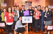 The Secretary for Labour and Welfare, Dr Law Chi-kwong, visited Kwun Tong District to attend the launch ceremony of Operation Warm Winter - Home Visit to the Elderly at Lam Tin (East) Community Hall and pay home visits. Photo shows Dr Law with other officiating guests of the launch ceremony before paying home visits.