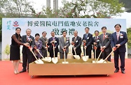Mr Cheung (fifth right) and other officiating guests are pictured at the ground-breaking ceremony of the residential care home for elderly persons in Lam Tei, Tuen Mun.