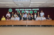 Mr Cheung (front row, fifth right) with the Chairman and members of Kwai Tsing District Council.