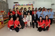 Mr Cheung (second row, third left) is pictured with Mrs So (second row, second right), Ms Wong (back row, sixth left), Mr Alan Lo (second row, second left), and staff of Yan Chai Hospital Tung Pak Ying Kindergarten/Child Care Centre.