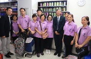 The Secretary for Labour and Welfare, Dr Law Chi-kwong, visited the Yang Memorial Methodist Social Service Senior Citizen Cognitive Training Centre. Picture shows Dr Law (fourth right) and the Under Secretary for Labour and Welfare, Mr Caspar Tsui (first left) with the Centre's staff responsible for meal delivery service.
