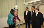 The Chairman of the Standing Committee of the National People's Congress, Mr Zhang Dejiang (third right), visits the rehabilitation room of the Hong Kong Sheng Kung Hui Tseung Kwan O Aged Care Complex in Tseung Kwan O this morning. Joining him are the Chief Executive, Mr C Y Leung (second right), and the Secretary for Labour and Welfare, Mr Matthew Cheung Kin-chung (first right).