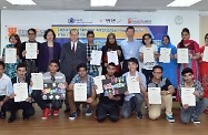 The Labour Department held an encouragement session for the trainees of the Employment Services Ambassador Programme for Ethnic Minorities. Photo shows the Secretary for Labour and Welfare, Mr Matthew Cheung Kin-chung (back row, fifth left); the Assistant Commissioner for Labour (Employment Services), Mrs Tonia Leung (back row, fourth left); and the Chief Executive Officer of Baptist Oi Kwan Social Service, Mr Johnny Tsang (back row, eighth left), with the trainees.