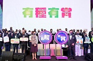 The Chief Executive, Mrs Carrie Lam, attended the Inauguration Ceremony for the 42nd General Committee of the Chinese Manufacturers' Association of Hong Kong (CMA) today (June 17). Photo shows Mrs Lam (front row, left) and the President of the CMA, Dr Allen Shi (front row, right) picturing with Deputy Commissioner of the Ministry of Foreign Affairs of the People's Republic of China in the Hong Kong Special Administrative Region Mr Yang Yirui (second row, fourth left); the Deputy Chief of Staff of the Chinese People's Liberation Army Hong Kong Garrison, Mr Liu Zhaohui (second row, third right); the President of the Legislative Council, Mr Andrew Leung (second row, second left); the Secretary for Labour and Welfare, Dr Law Chi-kwong (second row, first right) and other guests after officiating at the Kick-off Ceremony of the “Take Your Shot” Incentive Programme.
