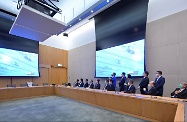 The Chief Executive, Mrs Carrie Lam (front row, seventh left), today (July 28) watches the Women's 200m Freestyle competition of the Tokyo 2020 Olympic Games through live TV broadcast with officials including Secretaries of Department and Directors of Bureau to cheer for Hong Kong swimmer Siobhan Bernadette Haughey.
