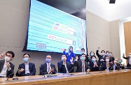 The Chief Executive, Mrs Carrie Lam (front row, fifth right), today (July 28) watches the Women's 200m Freestyle competition of the Tokyo 2020 Olympic Games through live TV broadcast with officials including Secretaries of Department and Directors of Bureau to cheer for Hong Kong swimmer Siobhan Bernadette Haughey.