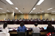 The Chief Secretary for Administration, Mr John Lee (front row, seventh left), chairs the 11th meeting of the Commission on Children today (August 6).