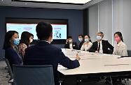 The Secretary for Labour and Welfare, Dr Law Chi-kwong, was joined by two Secondary Five students enrolled under the ⩴ Be a Government Official for a Day ⩴ Programme shadowing him in frontline visits today (August 18) to gain experience of his work. Photo shows Dr Law visiting the Service Centre for the Reimbursement of Maternity Leave Pay Scheme in Wong Chuk Hang to learn more about its operations and how it handles applications.