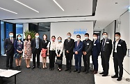 The Secretary for Labour and Welfare, Dr Law Chi-kwong, was joined by two Secondary Five students enrolled under the ⩴ Be a Government Official for a Day ⩴ Programme shadowing him in frontline visits today (August 18) to gain experience of his work. Photo shows Dr Law visiting the Service Centre for the Reimbursement of Maternity Leave Pay Scheme in Wong Chuk Hang to learn more about its operations and how it handles applications.