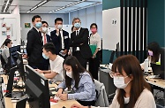 The Secretary for Labour and Welfare, Dr Law Chi-kwong, was joined by two Secondary Five students enrolled under the ⩴ Be a Government Official for a Day ⩴ Programme shadowing him in frontline visits today (August 18) to gain experience of his work. Photo shows Dr Law visiting the Service Centre for the Reimbursement of Maternity Leave Pay Scheme in Wong Chuk Hang to learn more about its operations and how it handles applications.