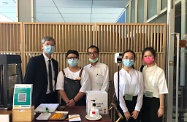 The Secretary for Labour and Welfare, Dr Law Chi-kwong, was joined by two Secondary Five students enrolled under the ⩴ Be a Government Official for a Day ⩴ Programme shadowing him in frontline visits today (August 18) to gain experience of his work. Photo shows Dr Law in lunch with both students in a social enterprise restaurant in Tamar which employs and provides training to persons with disabilities.