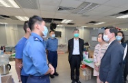 The Chief Secretary for Administration, Mr John Lee, visited Penny's Bay Quarantine Centre on Lantau Island this afternoon (September 7) to view the preparatory work for opening some of the quarantine units at the centre for foreign domestic helpers arriving in Hong Kong. Photo shows Mr Lee (second right) chatting with colleagues from the Fire Services Department to learn about their work in operating the quarantine centre. Looking on are the Secretary for Labour and Welfare, Dr Law Chi-kwong (fourth right), and the Secretary for Food and Health, Professor Sophia Chan (third right).