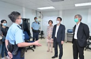 The Chief Secretary for Administration, Mr John Lee, visited Penny's Bay Quarantine Centre on Lantau Island this afternoon (September 7) to view the preparatory work for opening some of the quarantine units at the centre for foreign domestic helpers arriving in Hong Kong. Photo shows Mr Lee (second right) chatting with colleagues from the Hong Kong Police Force to learn about their work in operating the quarantine centre. Looking on are the Secretary for Labour and Welfare, Dr Law Chi-kwong (first right), and the Secretary for Food and Health, Professor Sophia Chan (third right). 
