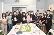 The Secretary for Labour and Welfare, Dr Law Chi-kwong, visited the Sandy Bay Parents Resource Centre of Heep Hong Society in Pok Fu Lam this afternoon (September 24) to learn more about the community support services for parents and relatives/carers of persons with disabilities. Photo shows Dr Law (sixth left) and the Chief Executive Officer of Heep Hong Society, Ms Rachel Leung (eighth left), with centre staff and parents and relatives/carers of persons with disabilities.